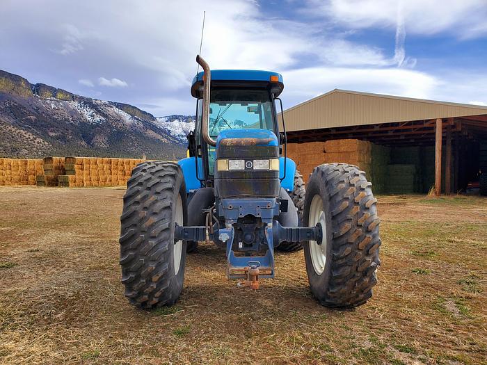 Used New Holland TV140 Bi-Directional Tractor
