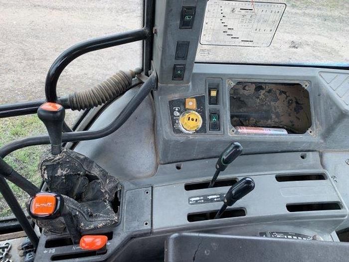 Used New Holland 7740 MFWD Tractor w/ loader