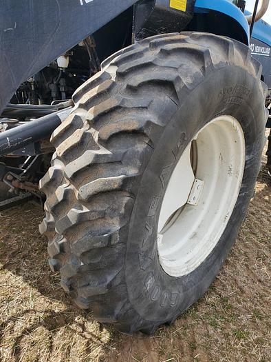Used New Holland TV140 Bi-Directional Tractor