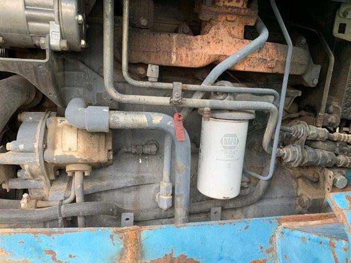 Used New Holland 7740 MFWD Tractor w/ loader