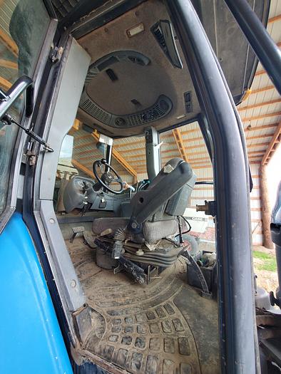 Used New Holland TV140 Bi-Directional Tractor