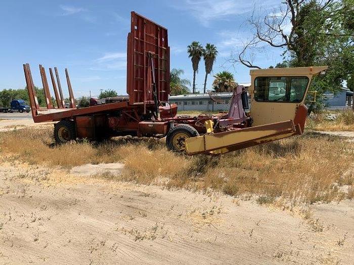 Used New Holland 1095 Bale wagon with Mil-Stak clamp