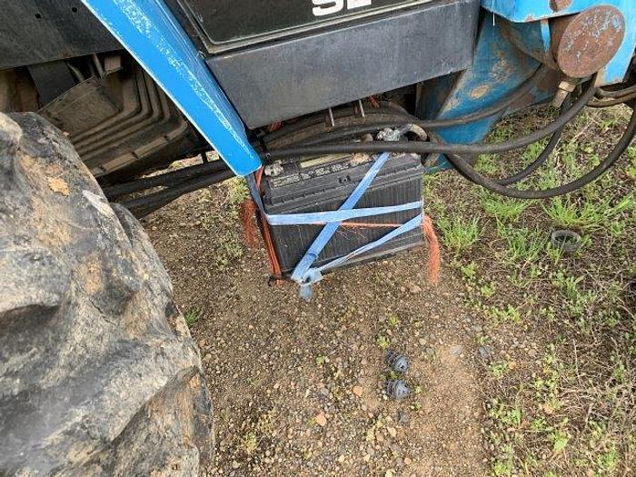 Used New Holland 7740 MFWD Tractor w/ loader