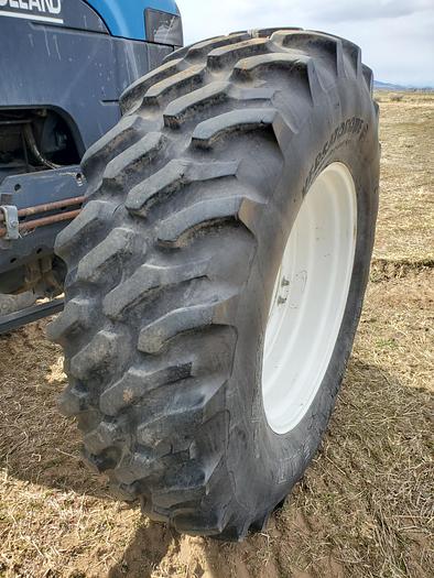 Used New Holland TV140 Bi-Directional Tractor