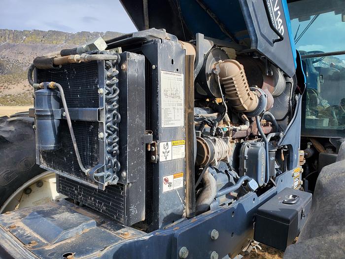 Used New Holland TV140 Bi-Directional Tractor