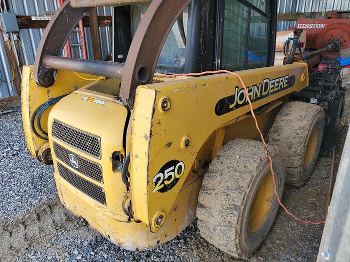 Used John Deere 250 Skid Steer w/ 4 Attachments