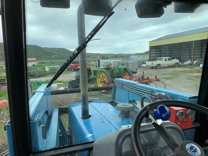 Used New Holland 7740 MFWD Tractor w/ loader