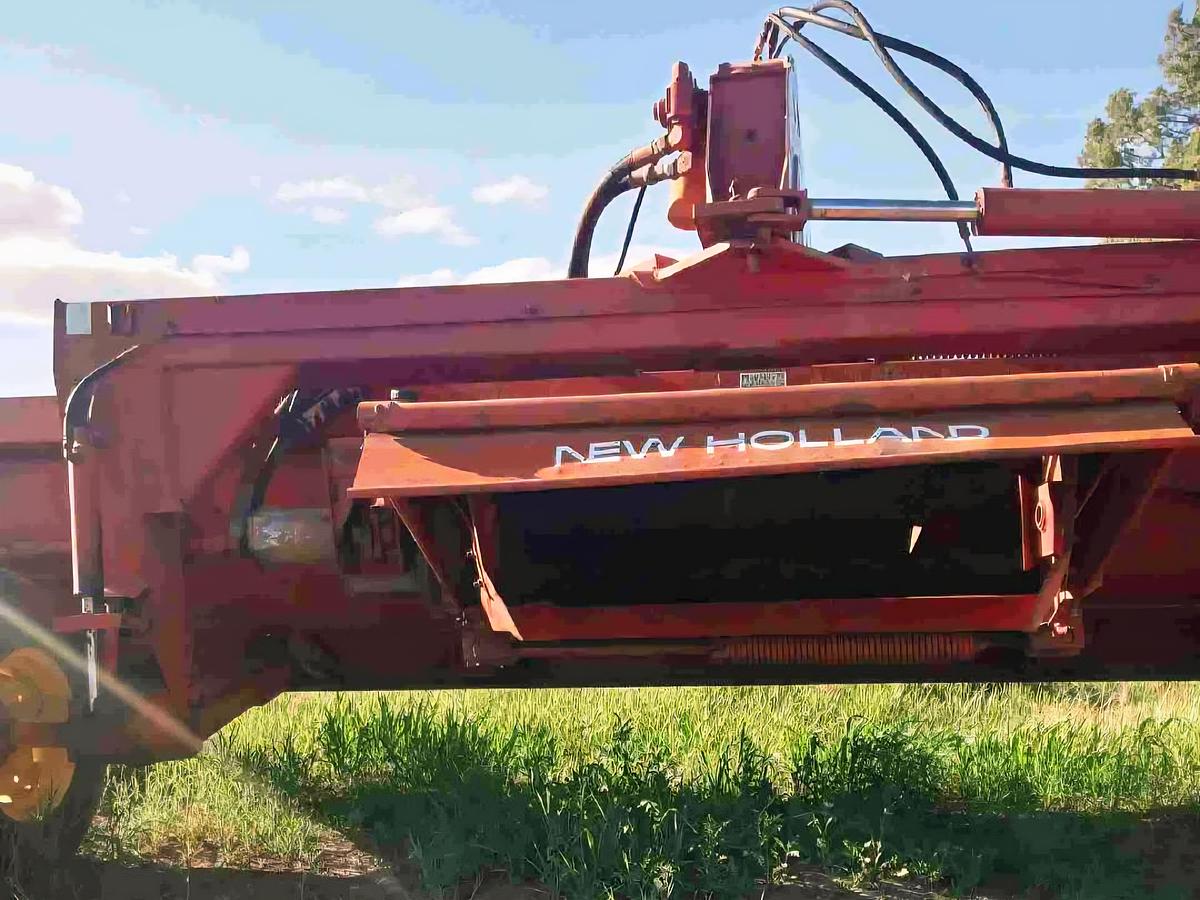 Used 14' New Holland 114 Pivot Tongue Windrower