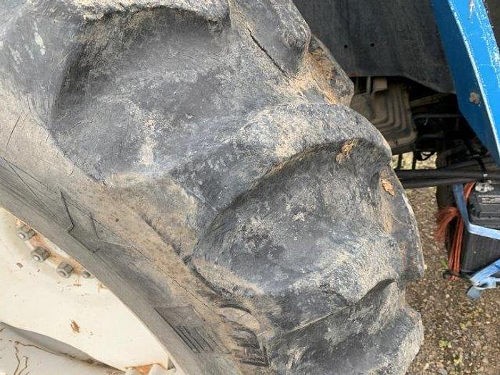 Used New Holland 7740 MFWD Tractor w/ loader