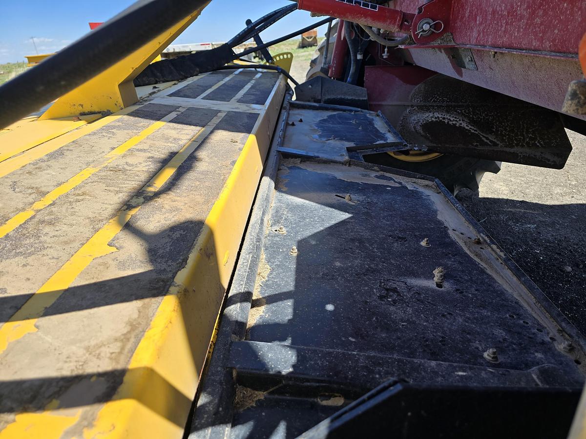 Used ** Going to Auction ** 2014 New Holland H8080 Rotary Windrower w/ Newer Header