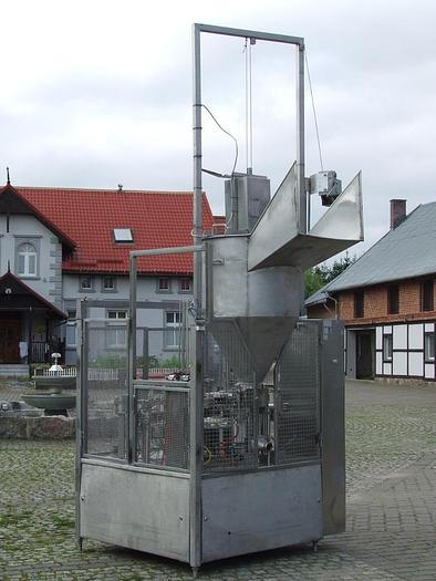 D'occasion Distributeur carrousel à 2 pistons et 2 rangées pour emballages en plastique et aluminium avec soudure de couvercles, "Grunwald"