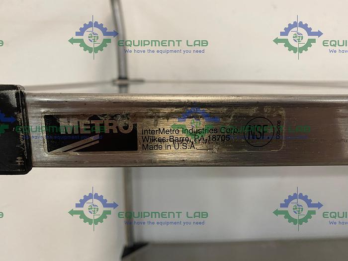 Used Metro  60" W x 24" D x 38" H Two Tier Stainless Steel Rolling Utility Cart