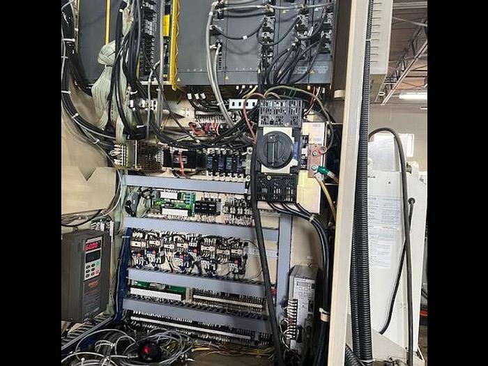 Used 1998 OKUMA & HOWA 611V - Fanuc control, 50 Taper