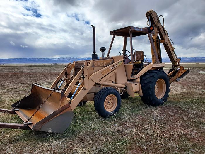 Used Case 580SE Backhoe w/ Attachments
