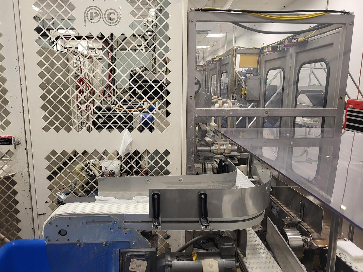 Used PCMC rx300 Wipe Manufacturing Line