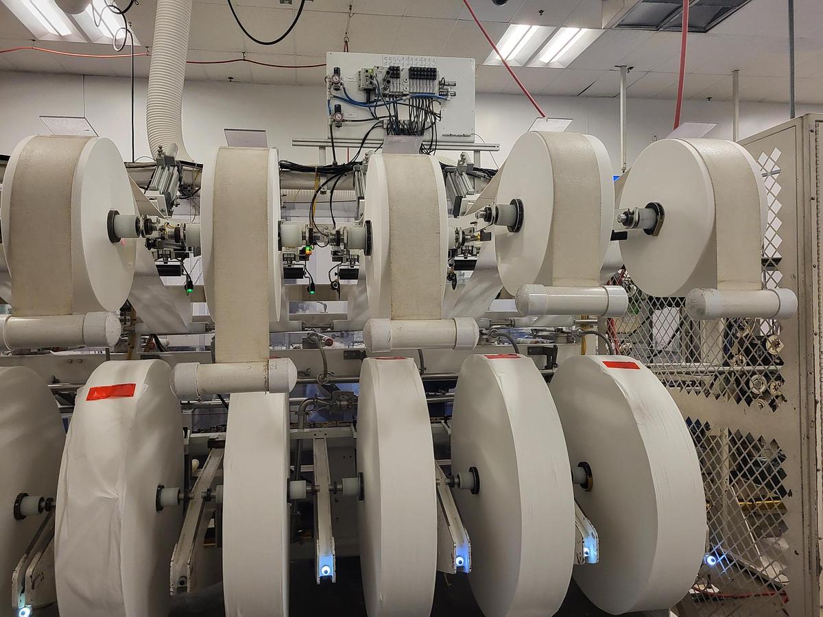 Used PCMC rx300 Wipe Manufacturing Line