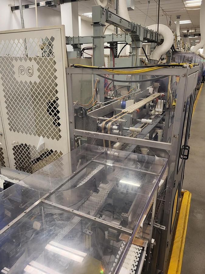 Used PCMC rx300 Wipe Manufacturing Line