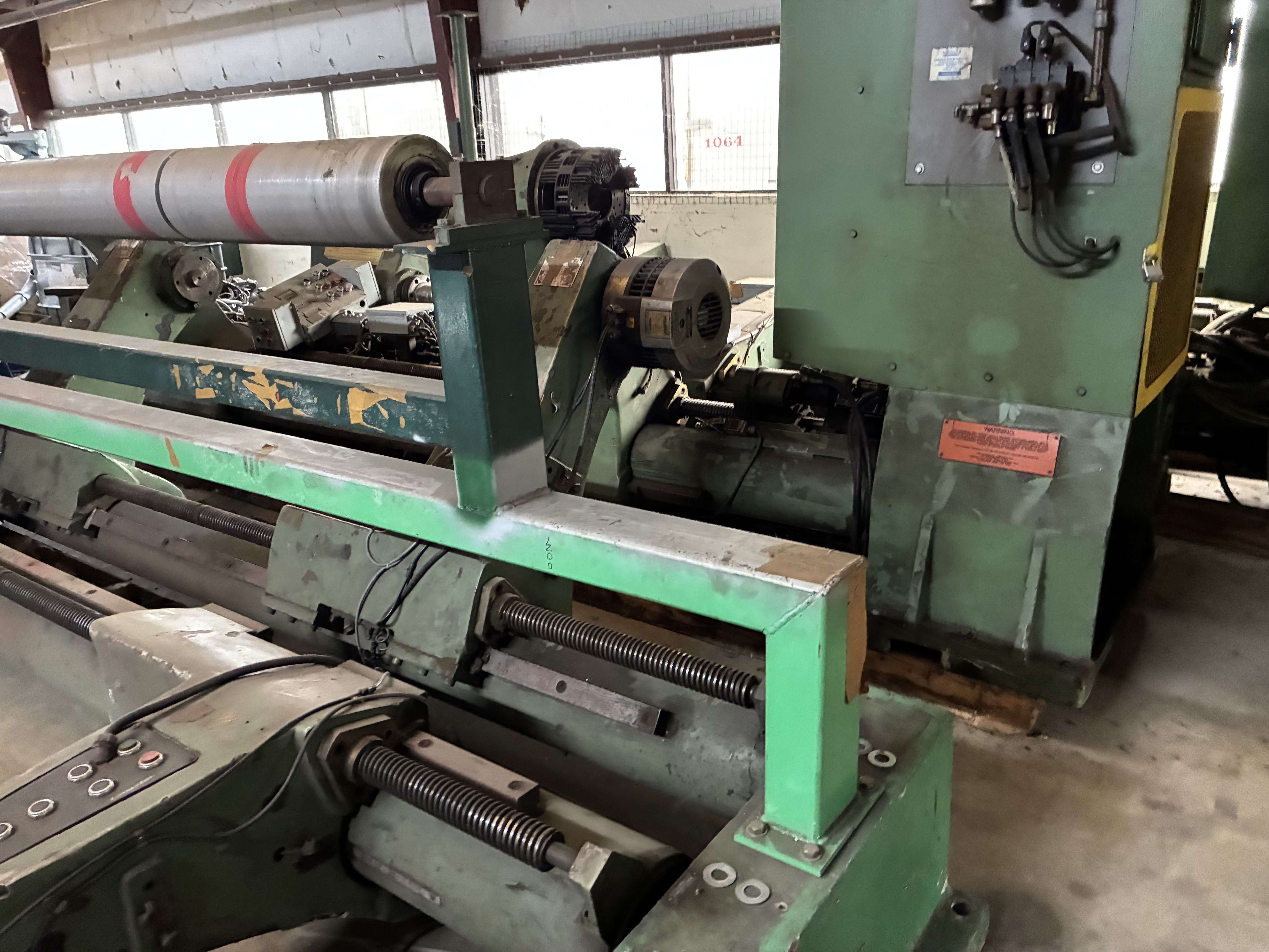 Used 98" Langston Duplex Roll Stands