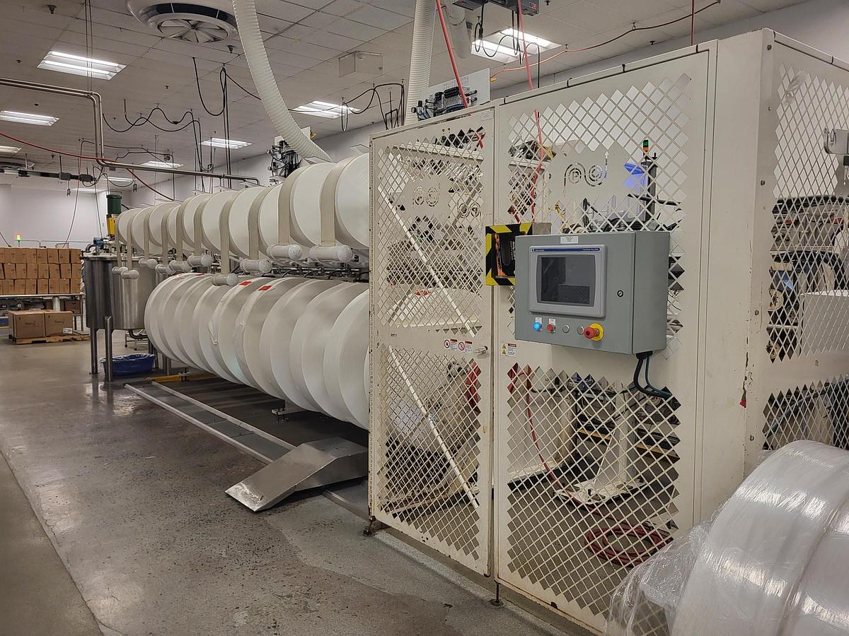 Used PCMC rx300 Wipe Manufacturing Line