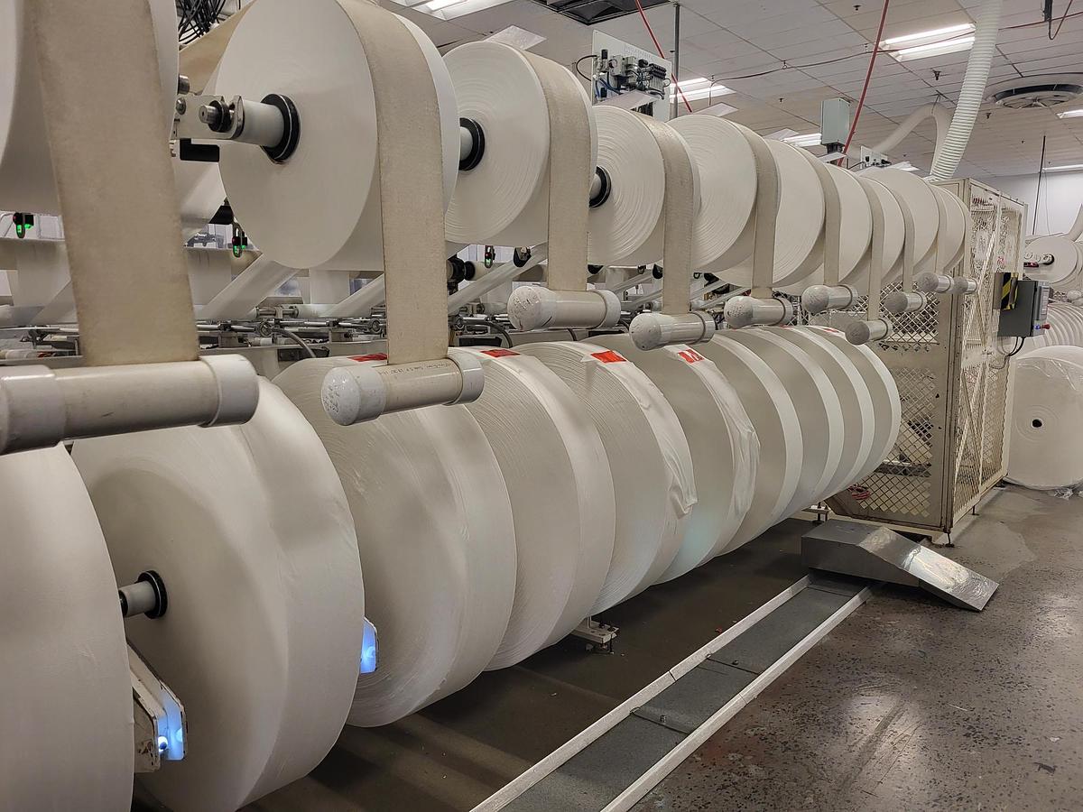 Used PCMC rx300 Wipe Manufacturing Line