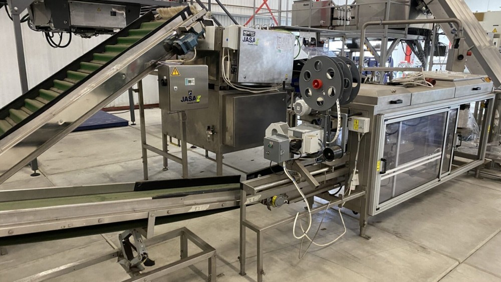 Used Newtec Htech weighing and bagging line