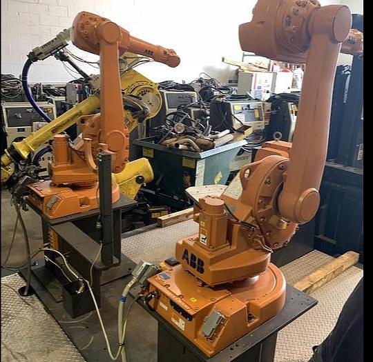 Used ABB IRB 1600-5/1.45 DUAL ARM ROBOTIC CELL WITH ABB TYPE MTC 750 POSITIONER AND IRC5 CONTROLLERS