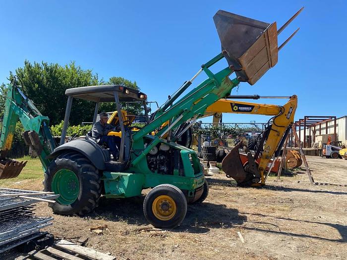 Used 1999 NEW HOLLAND 555E - BACKHOES