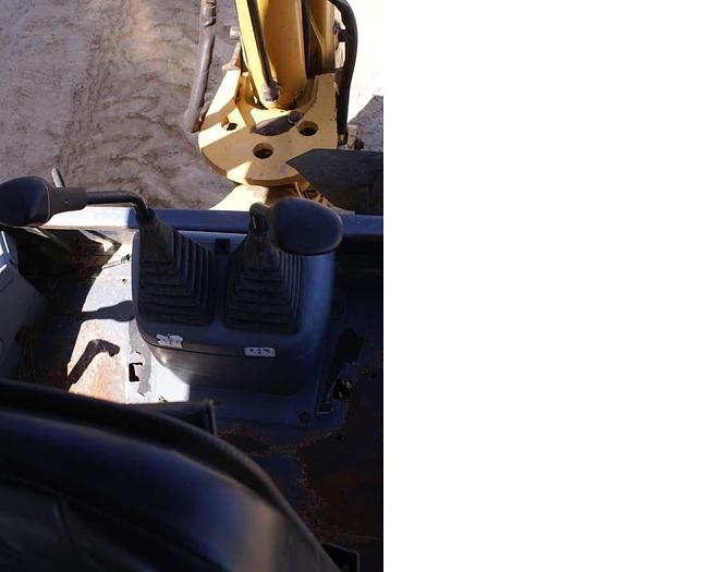 Used 1999  NEW HOLLAND 555E - BACKHOES