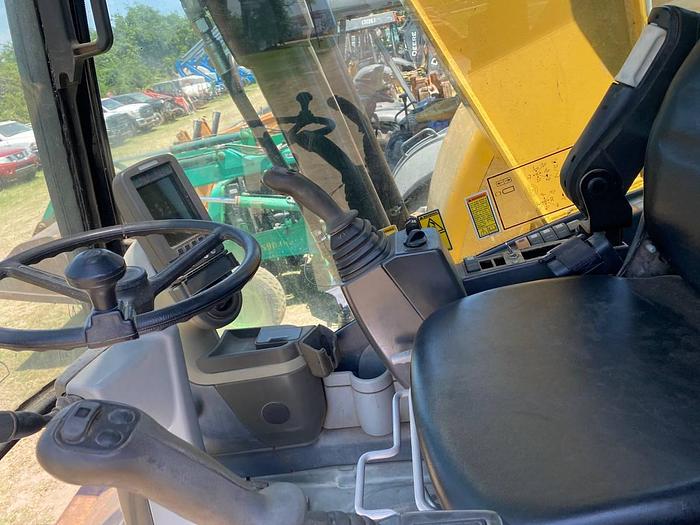 Used 1999 NEW HOLLAND 555E - BACKHOES