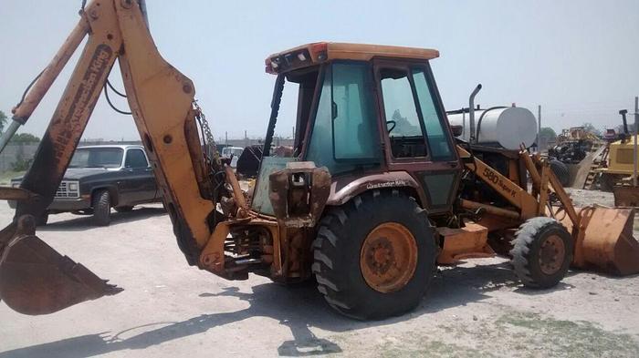 Used CATERPILLAR 580SK - BACKHOES