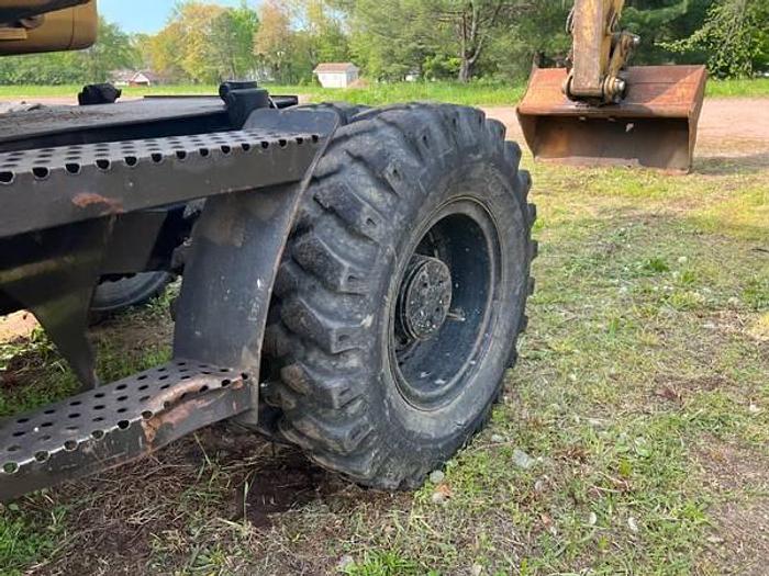 Used 2001 CATERPILLAR M312 - EXCAVATORS