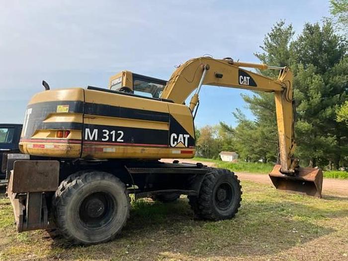 Used 2001 CATERPILLAR M312 - EXCAVATORS