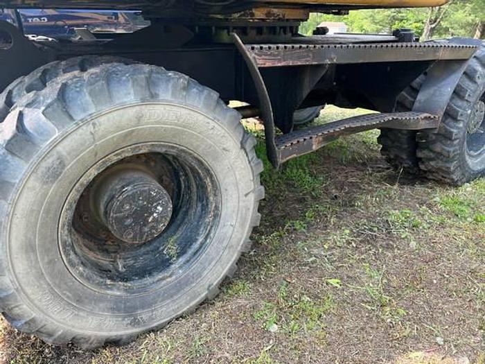 Used 2001 CATERPILLAR M312 - EXCAVATORS