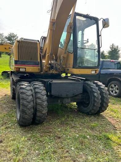 Used 2001 CATERPILLAR M312 - EXCAVATORS