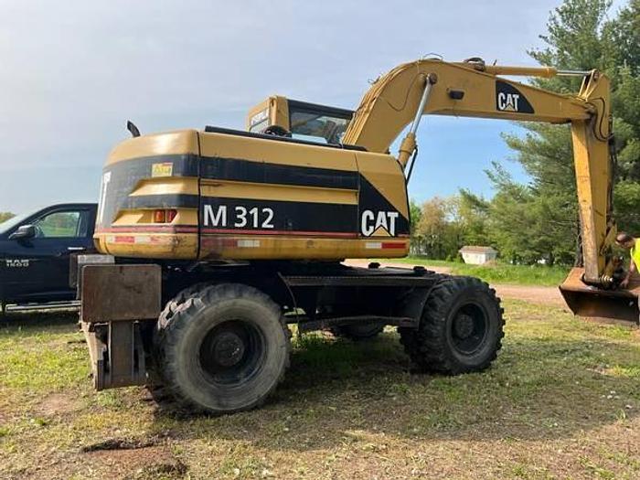 Used 2001 CATERPILLAR M312 - EXCAVATORS