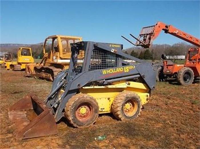 Used 2002 NEW HOLLAND LS180 - SKID STEER LOADERS