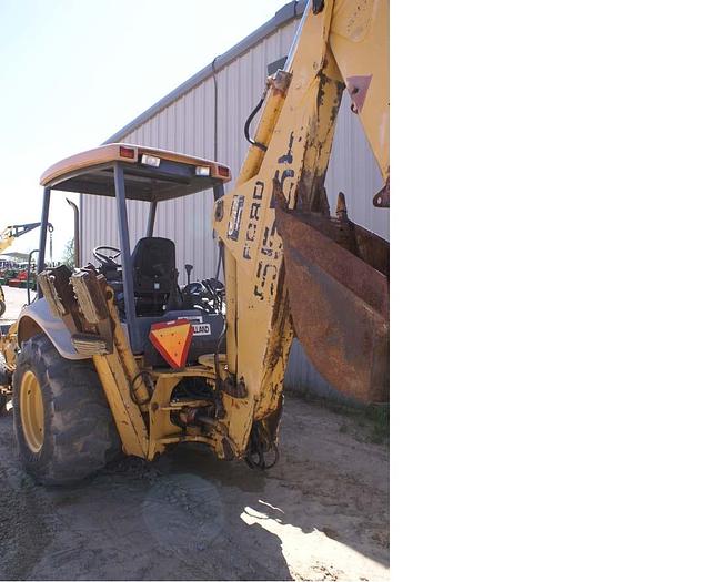 Used 1999  NEW HOLLAND 555E - BACKHOES