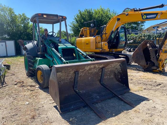Used 1999 NEW HOLLAND 555E - BACKHOES