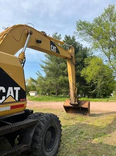 Used 2001 CATERPILLAR M312 - EXCAVATORS