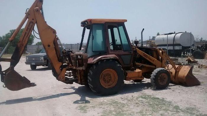 Used CATERPILLAR 580SK - BACKHOES