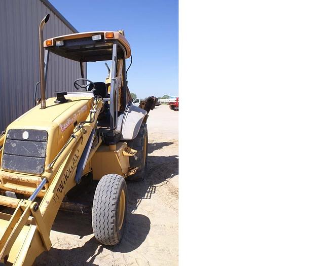 Used 1999  NEW HOLLAND 555E - BACKHOES