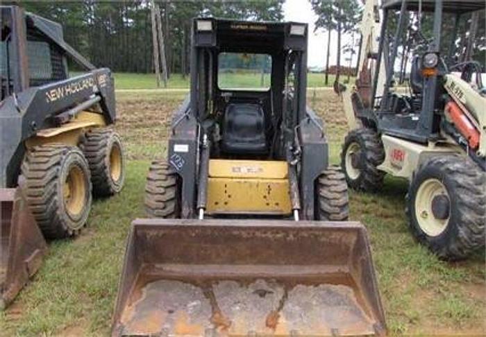Used 1995 NEW HOLLAND LX665 - SKID STEER LOADERS