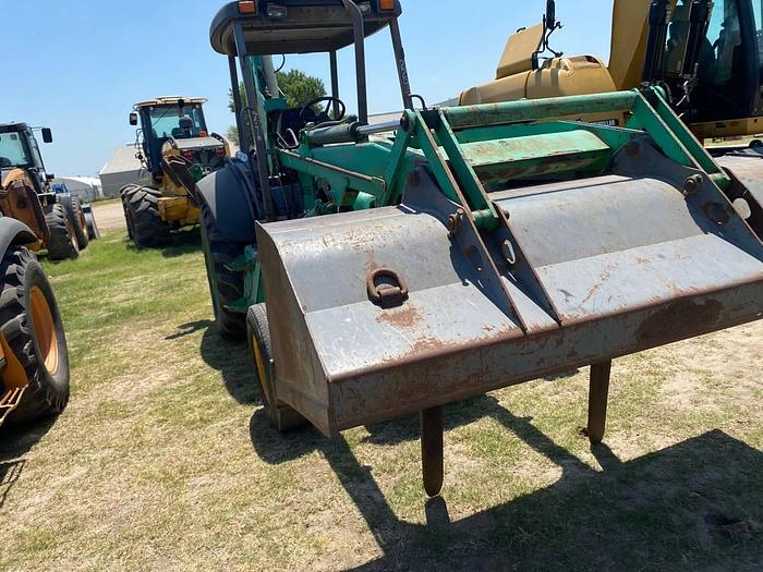 Used 1999 NEW HOLLAND 555E - BACKHOES