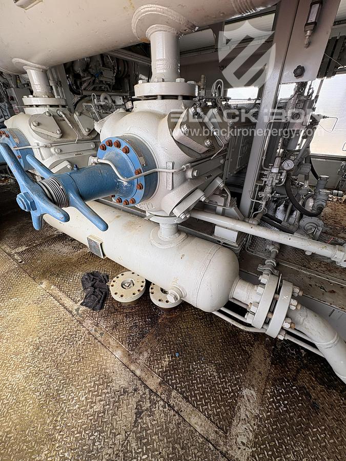 Used NOMAD Suction & Discharge Bottle