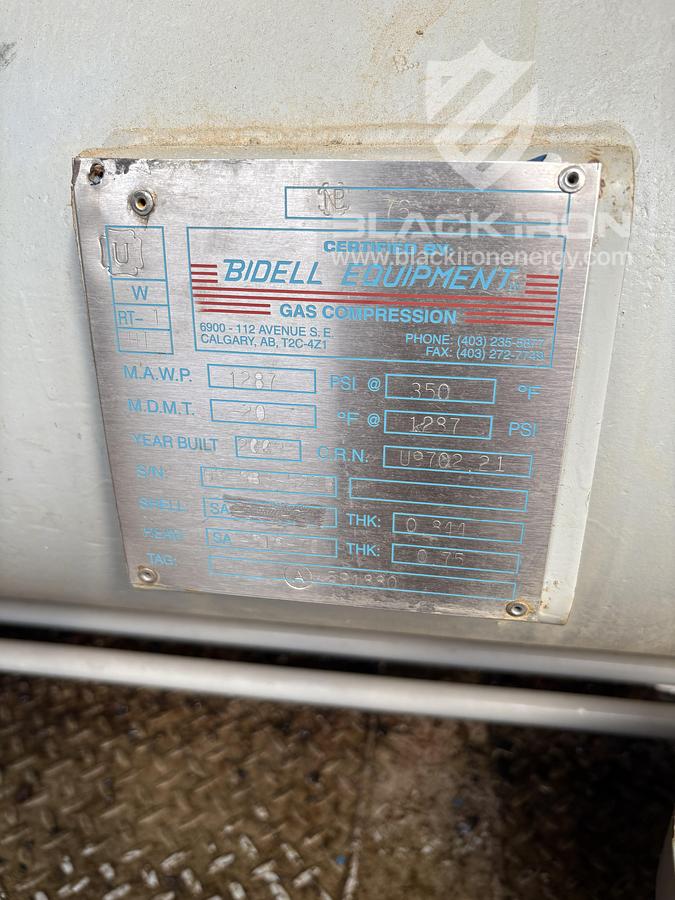 Used NOMAD Suction & Discharge Bottle