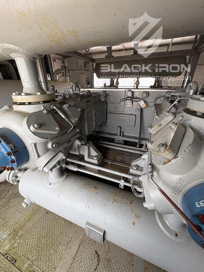 Used NOMAD Suction & Discharge Bottle