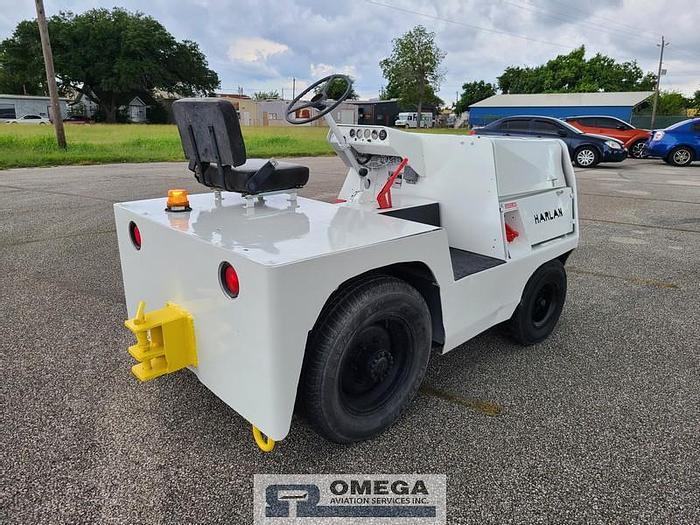 Used 2001 Harlan HTAG-50, baggage tow tractor.