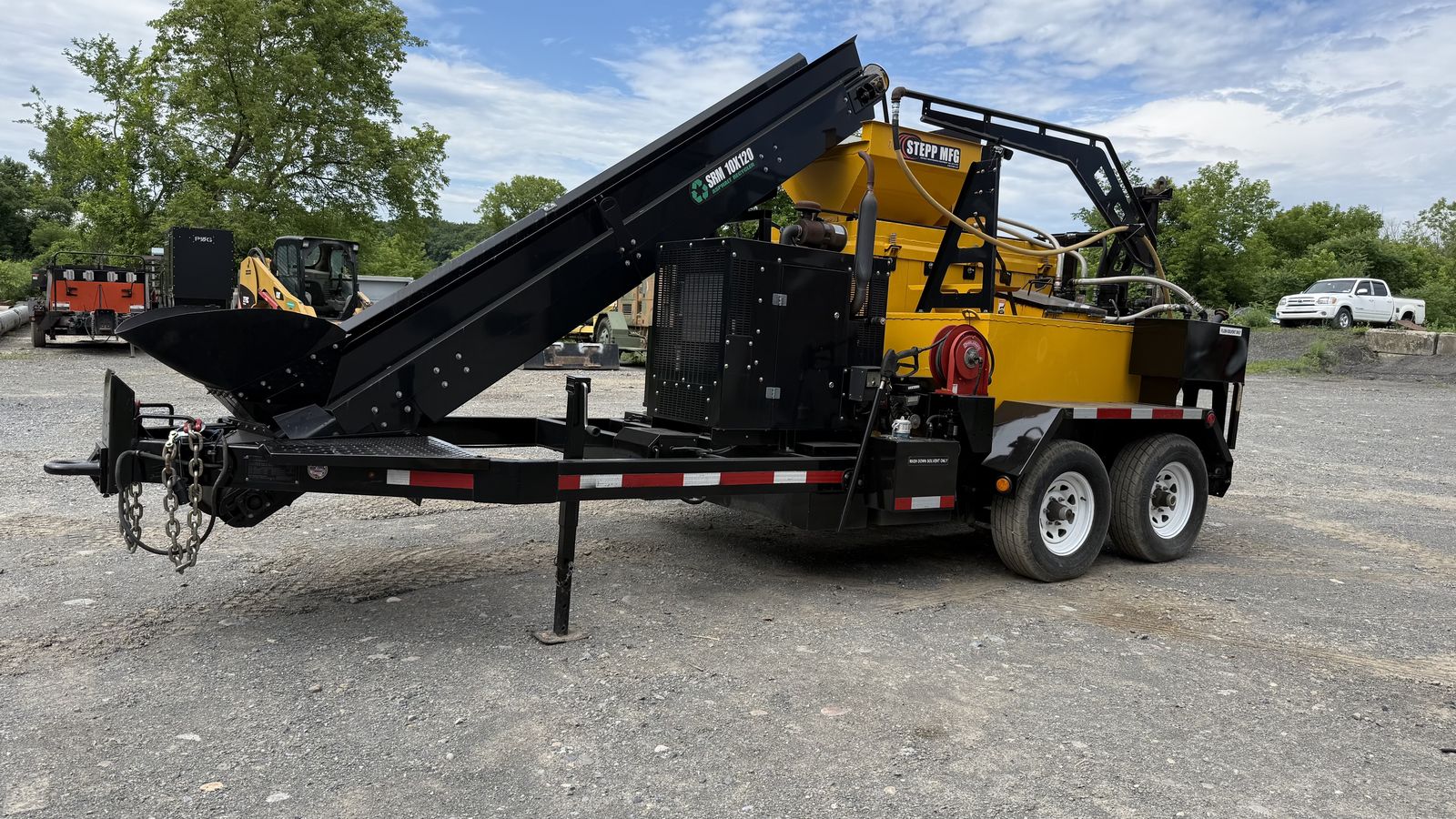 Used Stepp SRM 10-120  Asphalt Recycler 3/4 ton batch recycler with heated AC tank and wand