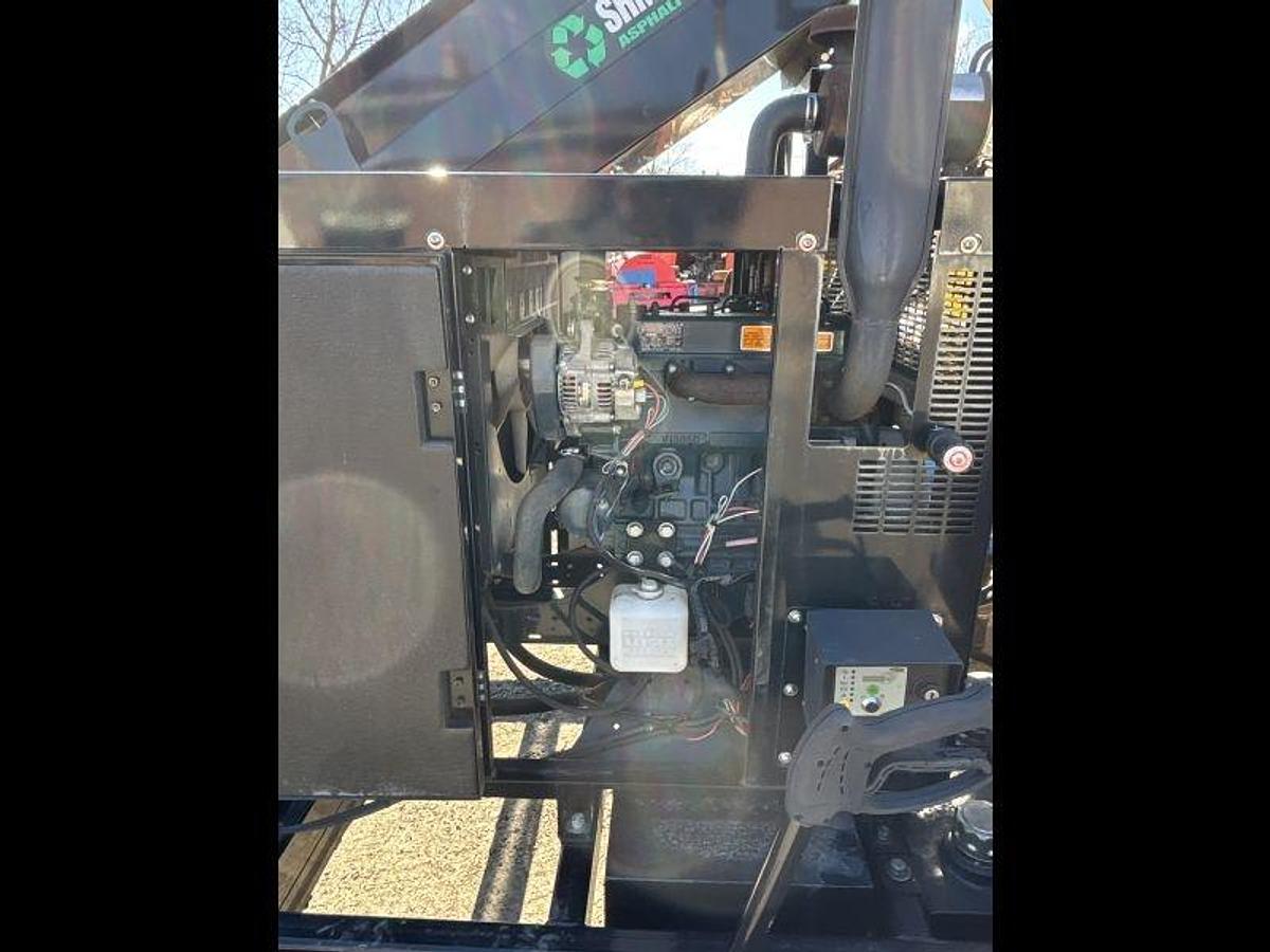 Used Stepp SRM 10-120  Asphalt Recycler 3/4 ton batch recycler with heated AC tank and wand