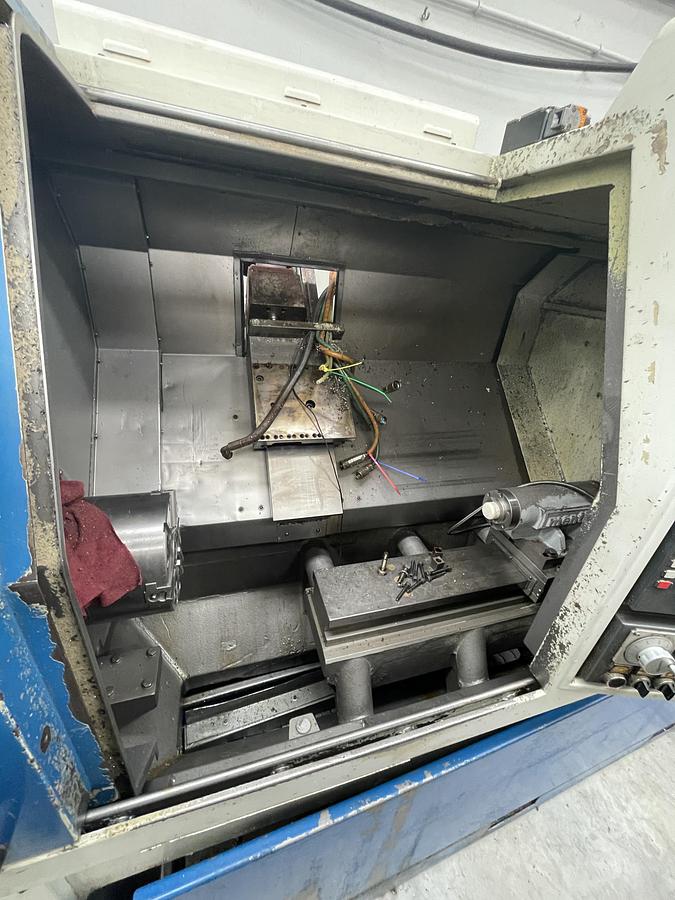 Used Manurhin Menti K'MX 250 - MENTI mod. 250 - 3 axis CNC lathe
